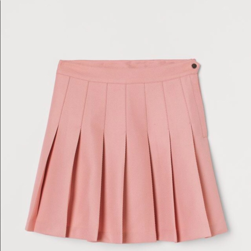 Pink pleated skater skirt